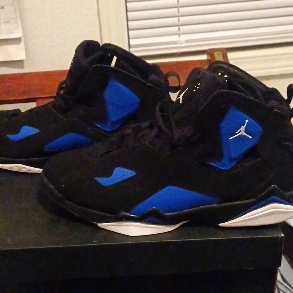 Size 12 jordon true flight ,blue and black,wore one time